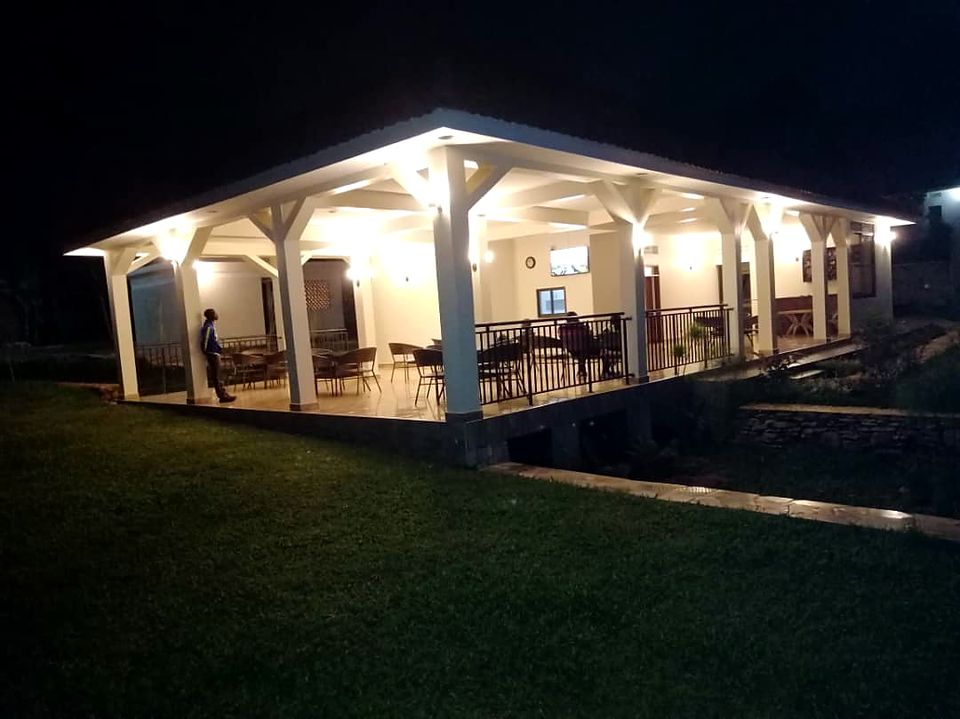 House veranda lit at night with exterior lighting